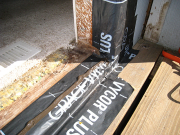 Doors are set on Vycor flashing & urethane sealant for moisture control