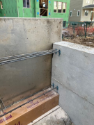 NE corner wall steel epoxied into existing concrete