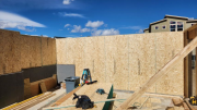 Interior garage walls are sheathed for easy insulation installation