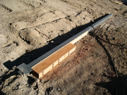 Long Steel Column with Timber Beam Attached  