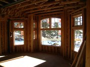 Living Room has 11 Windows and Large Door  