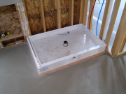 Shower Base in Laundry Room  