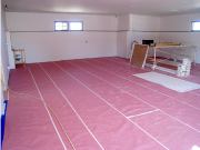 Garage Drywall Installed & Floors Protected with Rosin Paper  