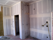 Interior Plumbing Wall in Garage is Insulated  