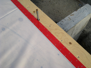 Perimeter of Plastic is Taped & Stapled
