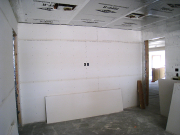 Swim room walls are sheathed with paperless drywall