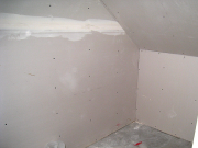 Framing and drywall under lower stairs