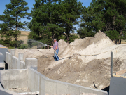 Chuck Watering Dirt before Backfilling
