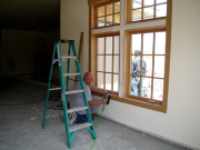 Chris is trimming garage windows