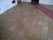 Basement tile being installed