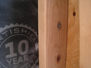 Trusses for battered walls are attached with Hilti screws