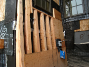 Battered wall by study south