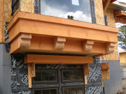Corbels under living room shelf installed
