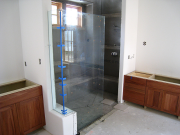 Glass panels at master bathroom