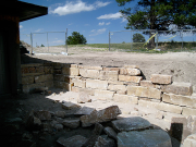 Retaining wall by east garage under construction
