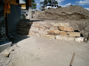 Retaining wall by walkout walls