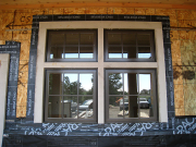 Window trim leaves space for stone sill