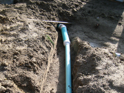 South patio rain collecting pipe