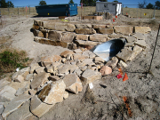 Drain and retaining wall by driveway