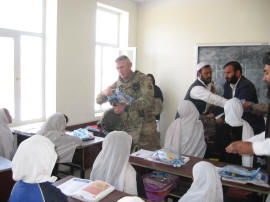 U.S. Soldier Delivering School Supplies