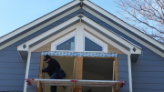 New windows at east gable being installed by Carlos