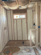 Foam wall and insulated batts in master bath ceiling for air efficiency & more comfort