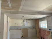 New drywall at kitchen ceiling