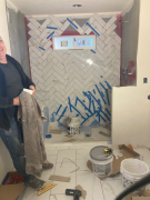 Herringbone tile installation