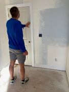 Paul checking door installation
