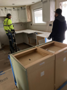 Kitchen countertop slab being installed