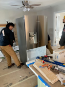 Refrigerator being installed