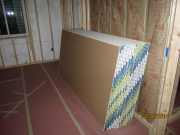 Drywall is stacked in basement