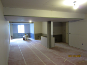 Drywall is hung and floors vacuumed