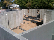 Steel beams being prepared for installation