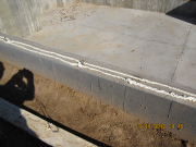 Sill plates set in expandable spray foam for air infilteration control