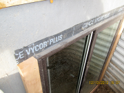 Second layer of Vycor over basement window flanges