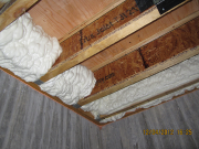 Foam insulation on rim board for air filtration control