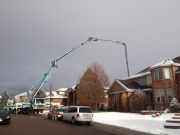 Pumping concrete over the house