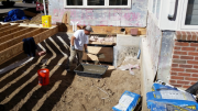 Carlos mixed concrete to block old window