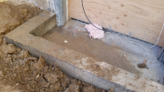 New concrete curb around crawlspace access