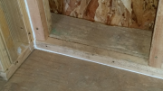 Caulked corners and bottom plates