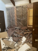 Demo of brick wall in bedroom