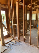 Interior wall bracing to hold up beams when blocks are removed