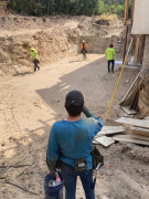 Foundation crew laying out footers