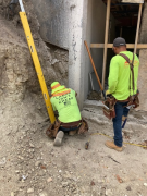 Foundation crew laying out footers