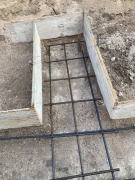 Wall counterfort footer with steel rebar