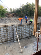 Walls being leveled & bolts installed