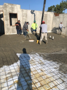 Placing concrete for basement floor