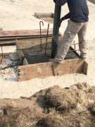 Placing concrete in pad