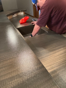 Wet bar sink being installed